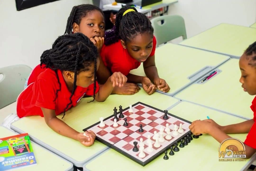 Primary learners playing chess