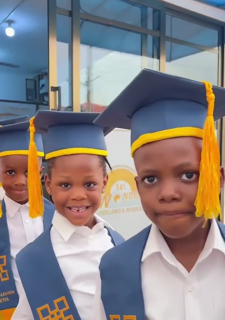 Kindergarten graduates in caps and gowns