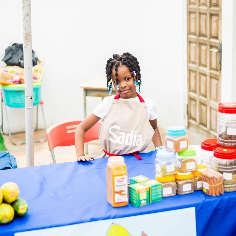 Junior entrepreneur at her Market Day stall