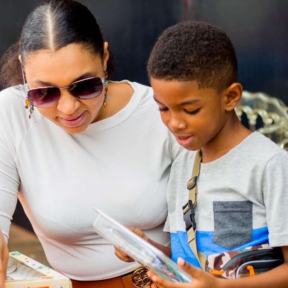 Parent and child shopping at Market Day